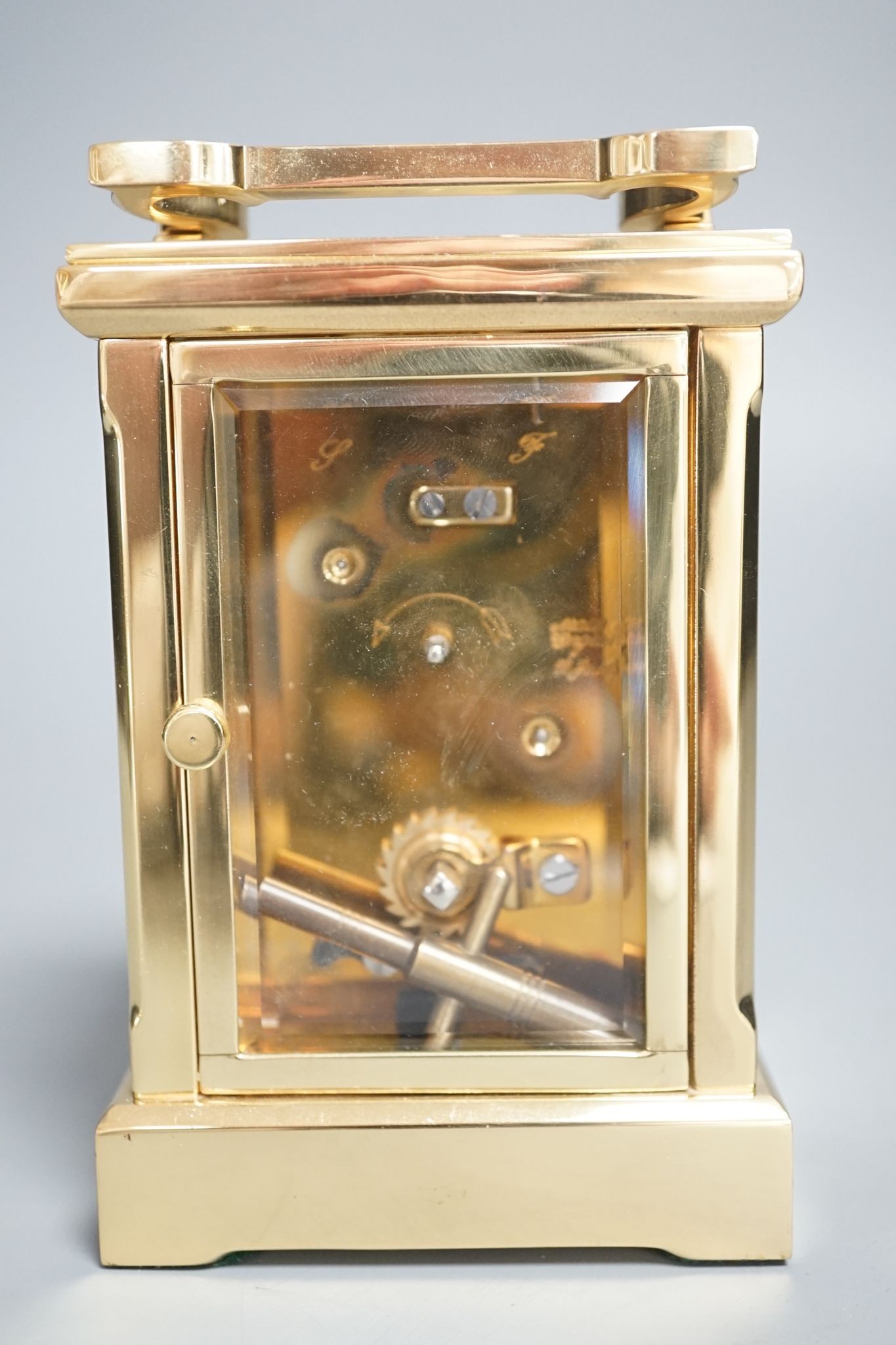 A Thos. Russell &Son brass carriage timepiece with key